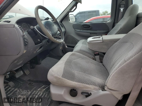 1999 Ford F-150 with VIN 1FTRF18W2XKB85753, listed as a Copart auction lot 55666595 with 78,888 mi miles and Salvage title. Bid and sale history available at DreamBid. Image 7.