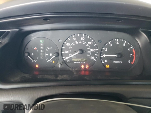2001 Toyota Camry CE z VIN JT2BG22K010543907, wystawiony jako Copart lot #60874815 z przebiegiem 313 008 mil mil oraz Czysty tytuł • Clean title. Historia ofert i sprzedaży dostępna na DreamBid. Obrazek 9.