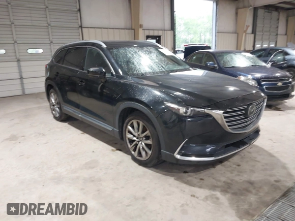 2016 Mazda CX-9 Signature z VIN JM3TCBEY5G0111286, wystawiony jako IAAI lot #42018161 z przebiegiem 155 920 mil mil oraz . Historia ofert i sprzedaży dostępna na DreamBid. Obrazek 1.