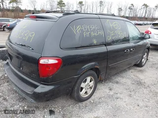 2006 Dodge Grand Caravan SXT with VIN 2D4GP44L16R616863, listed as a IAAI auction lot 41927585 with 999,999 mi miles. Bid and sale history available at carsss.com. Image 4.