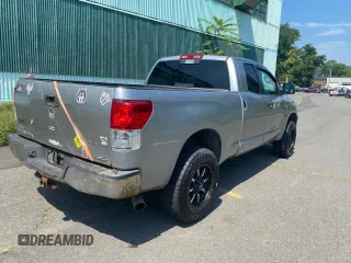 2010 Toyota Tundra with VIN 5TFUM5F11AX01281, listed as a Copart auction lot 66980935 with 308,906 mi miles and Clean title. Bid and sale history available at DreamBid. Image 4.