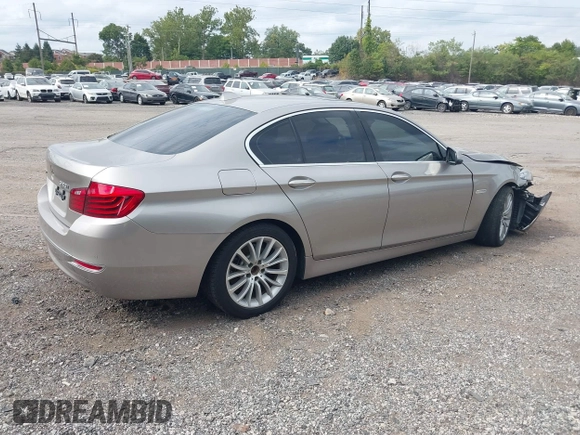 2014 BMW 5 Series 528i xDrive with VIN WBA5A7C56ED613949, listed as a IAAI auction lot 40353558 with 94,672 mi miles and . Bid and sale history available at DreamBid. Image 4.