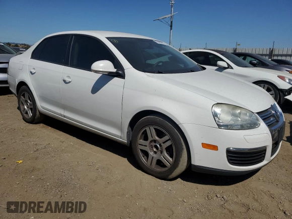 2010 Volkswagen Jetta S with VIN 3VWJZ7AJ0AM079420, listed as a Copart auction lot 62963995 with 244,277 mi miles and Salvage title. Bid and sale history available at DreamBid. Image 4.