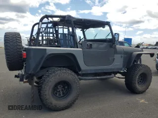 1990 Jeep Wrangler with VIN 2J4FY29T5LJ537896, listed as a Copart auction lot 57021295 with 143,753 mi miles and Clean title. Bid and sale history available at DreamBid. Image 3.