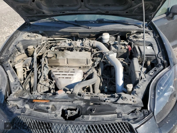 2009 Mitsubishi Eclipse GS with VIN 4A3AK24F79E022342, listed as a Copart auction lot 75669854 with 195,975 mi miles and Salvage Title. Bid and sale history available at carsss.com. Image 13.