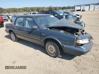 1996 Oldsmobile Cutlass Ciera 1SA VX5 z VIN 1G3AJ55M2T6328418, wystawiony jako Copart lot #77411634 z przebiegiem 29 918 mil mil oraz Szkody całkowita. Historia ofert i sprzedaży dostępna na DreamBid. Obrazek 4.