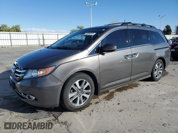 2015 Honda Odyssey Touring Elite with VIN 5FNRL5H94FB037299, listed as a Copart auction lot 53886345 with 109,032 mi miles and Salvage Title. Bid and sale history available at DreamBid. Image 1.