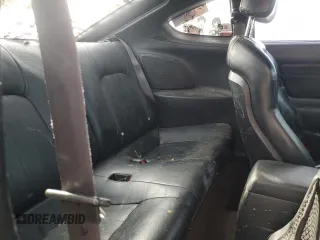 2003 Hyundai Tiburon GT z VIN KMHHN65F13U102985, wystawiony jako Copart lot #45294325 z przebiegiem 326 919 mil mil oraz Szkoda całkowita • Salvage title. Historia ofert i sprzedaży dostępna na DreamBid. Obrazek 10.