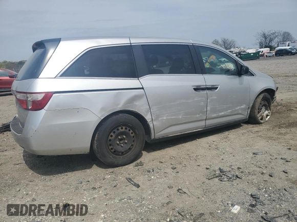 2013 Honda Odyssey LX z VIN 5FNRL5H28DB085114, wystawiony jako Copart lot #52942495 z przebiegiem 158 191 mil mil oraz Szkoda całkowita • Salvage title. Historia ofert i sprzedaży dostępna na DreamBid. Obrazek 3.