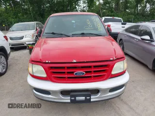 2003 Ford F-150 XL z VIN 1FTRF17203NA83617, wystawiony jako IAAI lot #42360791 z przebiegiem 285 094 mil mil oraz . Historia ofert i sprzedaży dostępna na DreamBid. Obrazek 6.