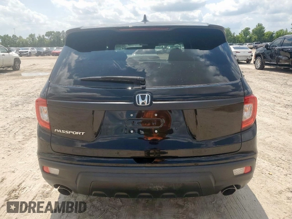 2019 Honda Passport EX-L с VIN 5FNYF7H50KB003009, выставлен на аукционе Copart как лот 59165035 с пробегом 61 313 миль миль и Списание • Salvage title. История ставок и продаж доступна на DreamBid. Изображение 6.