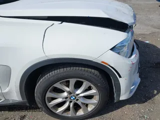 2016 BMW X5 sDrive35i with VIN 5UXKR2C55G0H43136, listed as a IAAI auction lot 41835931 with 125,751 mi miles. Bid and sale history available at carsss.com. Image 20.