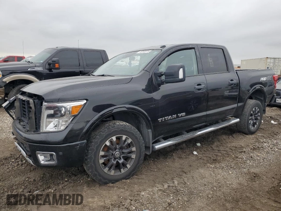 2018 Nissan Titan Pro-4X z VIN 1N6AA1E58JN523036, wystawiony jako Copart lot #45383075 z przebiegiem 153 047 mil mil oraz Czysty tytuł • Clean title. Historia ofert i sprzedaży dostępna na DreamBid. Obrazek 1.