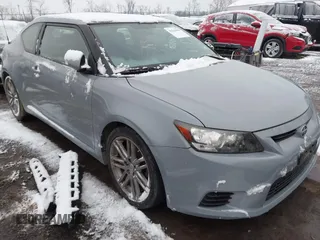 2012 Scion tC z VIN JTKJF5C72C3043758, wystawiony jako IAAI lot #41564038 z przebiegiem 147 578 mil mil oraz . Historia ofert i sprzedaży dostępna na DreamBid. Obrazek 1.