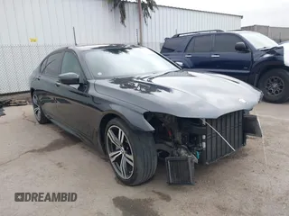 2019 BMW 7 Series 750i with VIN WBA7F0C50KGM26010, listed as a IAAI auction lot 42188421 with 71,576 mi miles and . Bid and sale history available at DreamBid. Image 1.