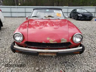 1977 FIAT 124 Spider z VIN 124CS10119615, wystawiony jako Copart lot #54527635 z przebiegiem 92 780 mil mil oraz Czysty tytuł • Clean title. Historia ofert i sprzedaży dostępna na DreamBid. Obrazek 5.