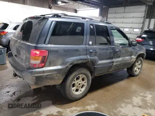 2001 Jeep Grand Cherokee Limited with VIN 1J4GW58N01C664996, listed as a Copart auction lot 58339825 with 288,153 mi miles and Salvage title. Bid and sale history available at DreamBid. Image 3.