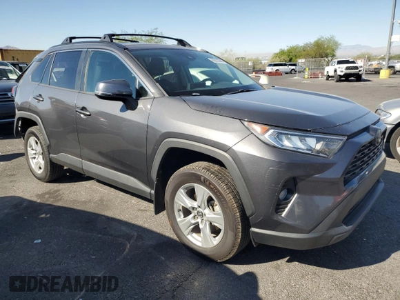 2020 Toyota RAV4 XLE with VIN 2T3W1RFV8LW070246, listed as a Copart auction lot 65072185 with 61,339 mi miles and Salvage title. Bid and sale history available at DreamBid. Image 4.