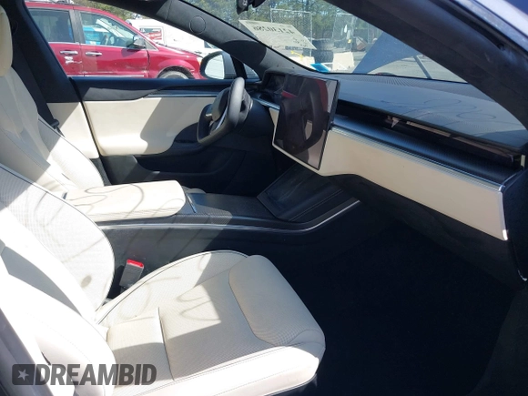 2021 Tesla Model S Plaid with VIN 5YJSA1E66MF456357, listed as a IAAI auction lot 42130286 with 48,010 mi miles. Bid and sale history available at carsss.com. Image 5.
