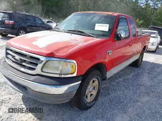 2002 Ford F-150 XL with VIN 1FTRX17W12NA07936, listed as a IAAI auction lot 42068598 with 1 mi miles. Bid and sale history available at carsss.com. Image 2.