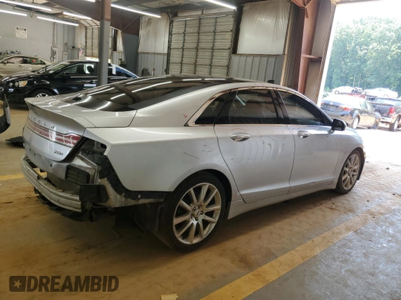 2015 Lincoln MKZ Hybrid z VIN 3LN6L2LU1FR606066, wystawiony jako Copart lot #61955415 z przebiegiem 127 214 mil mil oraz Szkoda całkowita • Salvage title. Historia ofert i sprzedaży dostępna na DreamBid. Obrazek 3.
