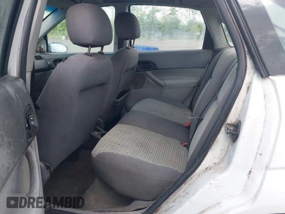 2007 Ford Focus S with VIN 1FAHP34N97W205190, listed as a IAAI auction lot 42489527 with 257,586 mi miles and . Bid and sale history available at DreamBid. Image 8.