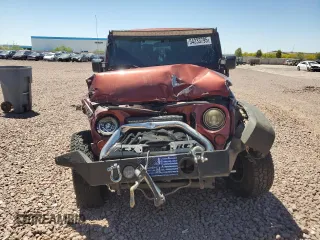 2010 Jeep Wrangler Rubicon with VIN 1J4BA6D14AL167077, listed as a Copart auction lot 54233795 with 148,638 mi miles and Salvage title. Bid and sale history available at DreamBid. Image 5.