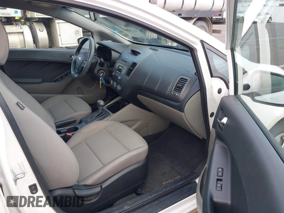 2015 Kia Forte LX with VIN KNAFX4A64F5429778, listed as a IAAI auction lot 41732846 with 167,253 mi miles. Bid and sale history available at carsss.com. Image 5.