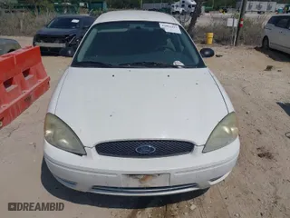 2006 Ford Taurus SE with VIN 1FAHP532X6A257510, listed as a IAAI auction lot 41892422 with 130,633 mi miles. Bid and sale history available at carsss.com. Image 6.