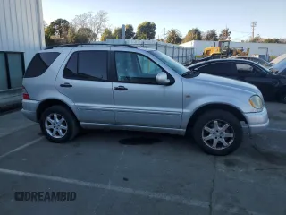 2000 Mercedes-Benz M 320/430/500 with VIN 4JGAB72E0YA167962, listed as a Copart auction lot 89158575 with 194,471 mi miles and Salvage title. Bid and sale history available at DreamBid. Image 4.