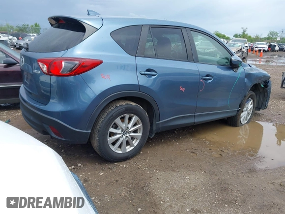 2016 Mazda CX-5 Touring z VIN JM3KE2CY3G0728968, wystawiony jako IAAI lot #42189174 z przebiegiem 145 977 mil mil oraz . Historia ofert i sprzedaży dostępna na DreamBid. Obrazek 4.