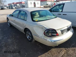 2002 Lincoln Continental with VIN 1LNHM97V02Y600322, listed as a IAAI auction lot 41714349 with 226,142 mi miles and . Bid and sale history available at DreamBid. Image 3.
