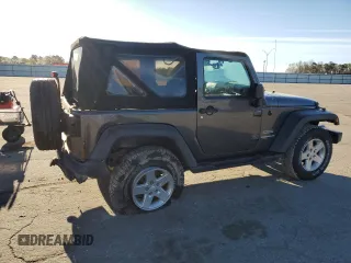 2016 Jeep Wrangler Willys Wheeler with VIN 1C4AJWAG5GL266235, listed as a Copart auction lot 50237195 with 60,830 mi miles and Salvage title. Bid and sale history available at DreamBid. Image 3.