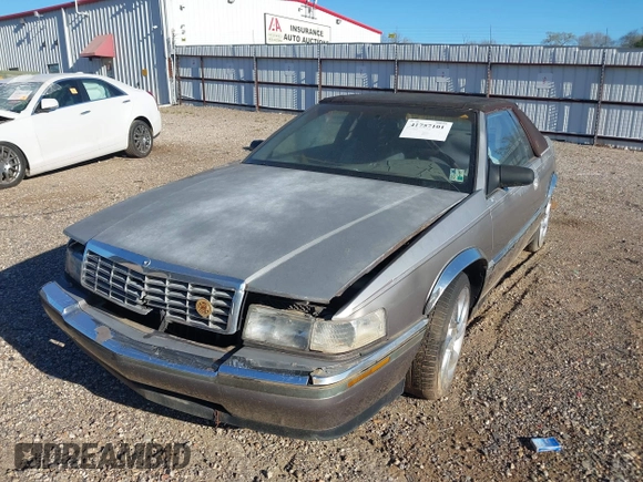 1992 Cadillac Seville z VIN 1G6EL13B2N0612154, wystawiony jako IAAI lot #41757101 z przebiegiem Nie podano mil oraz . Historia ofert i sprzedaży dostępna na DreamBid. Obrazek 11.