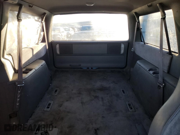 1994 Dodge Caravan Grand SE z VIN 1B4GH44R1RX330819, wystawiony jako Copart lot #83548684 z przebiegiem 187 408 mil mil oraz Szkody całkowita. Historia ofert i sprzedaży dostępna na DreamBid. Obrazek 10.