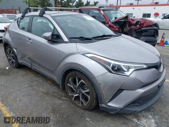 2018 Toyota C-HR XLE with VIN NMTKHMBX8JR032422, listed as a IAAI auction lot 42038240 with 132,553 mi miles and . Bid and sale history available at DreamBid. Image 19.