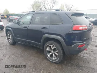 2014 Jeep Cherokee Trailhawk with VIN 1C4PJMBB5EW120432, listed as a IAAI auction lot 41973114 with 88,795 mi miles. Bid and sale history available at carsss.com. Image 3.