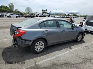 2012 Honda Civic LX z VIN 19XFB2F56CE390987, wystawiony jako Copart lot #56753635 z przebiegiem 81 832 mil mil oraz Szkoda całkowita • Salvage title. Historia ofert i sprzedaży dostępna na DreamBid. Obrazek 3.
