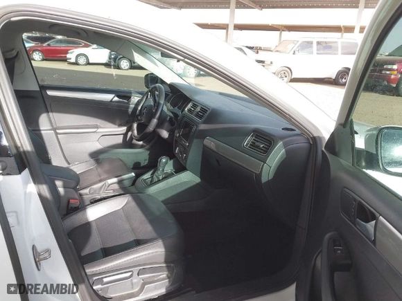 2016 Volkswagen Jetta Sedan 1.4T SE w/Connectivity with VIN 3VWD67AJ9GM360727, listed as a IAAI auction lot 41430367 with 124,993 mi miles. Bid and sale history available at carsss.com. Image 5.