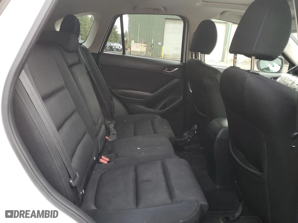 2016 Mazda CX-5 Touring with VIN JM3KE4CY5G0908092, listed as a Copart auction lot 49504015 with 126,825 mi miles and Salvage Title. Bid and sale history available at carsss.com. Image 11.