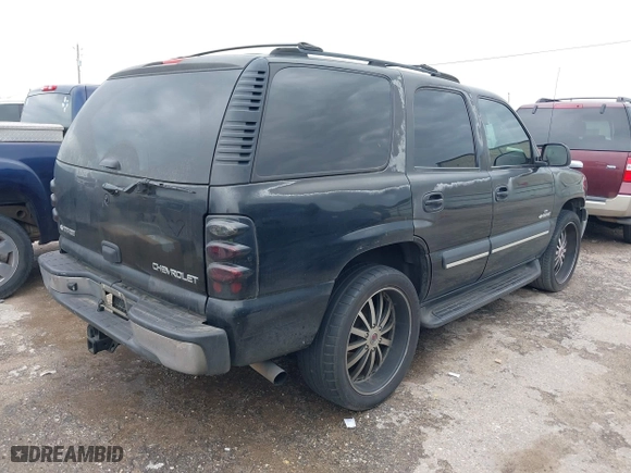 2003 Chevrolet Tahoe LT with VIN 1GNEC13Z13J297511, listed as a IAAI auction lot 41902595 with 293,195 mi miles. Bid and sale history available at carsss.com. Image 4.