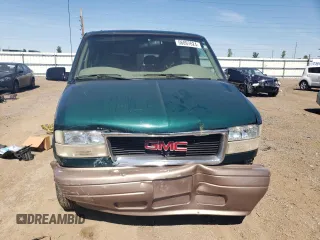 2001 GMC Safari with VIN 1GKDM19W71B511332, listed as a Copart auction lot 56097624 with 124,493 mi miles and Salvage Title. Bid and sale history available at carsss.com. Image 5.
