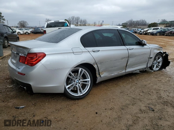 2012 BMW 7 Series 740Li with VIN WBAKB4C50CC576043, listed as a Copart auction lot 42060065 with 142,017 mi miles and Salvage Title. Bid and sale history available at carsss.com. Image 3.