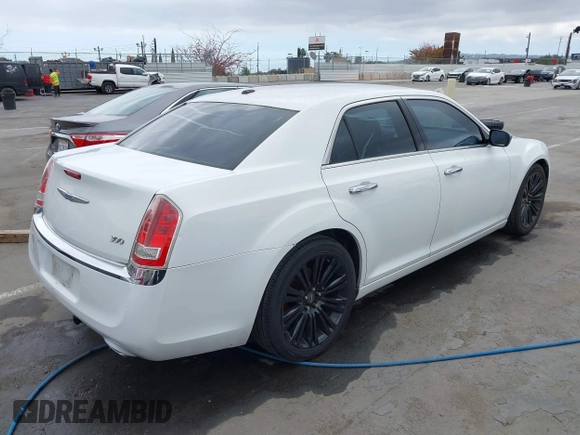 2012 Chrysler 300 Limited with VIN 2C3CCACG2CH237841, listed as a IAAI auction lot 42134640 with 140,554 mi miles. Bid and sale history available at carsss.com. Image 4.
