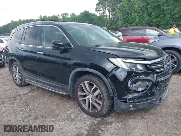 2017 Honda Pilot Touring with VIN 5FNYF5H99HB037126, listed as a IAAI auction lot 42275048 with 164,289 mi miles and . Bid and sale history available at DreamBid. Image 1.