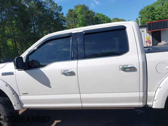 2015 Ford F-150 XLT with VIN 1FTEW1EG2FFC77044, listed as a IAAI auction lot 42094571 with 213,408 mi miles and . Bid and sale history available at DreamBid. Image 14.