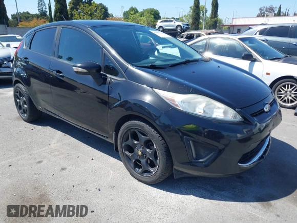 2011 Ford Fiesta SES with VIN 3FADP4FJ9BM181965, listed as a IAAI auction lot 42092140 with 150,304 mi miles. Bid and sale history available at carsss.com. Image 1.
