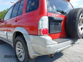 2005 Suzuki Grand Vitara LX z VIN JS3TD62VX54201211, wystawiony jako IAAI lot #42220221 z przebiegiem 242 165 mil mil oraz . Historia ofert i sprzedaży dostępna na DreamBid. Obrazek 17.