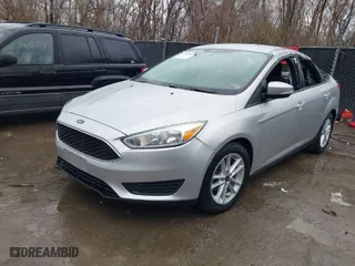 2018 Ford Focus SE with VIN 1FADP3F20JL306628, listed as a IAAI auction lot 41835004 with 28,070 mi miles. Bid and sale history available at carsss.com. Image 2.