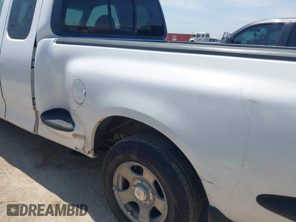 1999 Ford F-150 with VIN 1FTRX07W0XKA01385, listed as a IAAI auction lot 42247809 with 147,105 mi miles and . Bid and sale history available at DreamBid. Image 6.